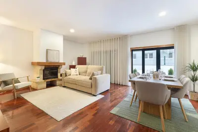 a living room with a couch and a table at ON Apartments - Family Retreat in Porto