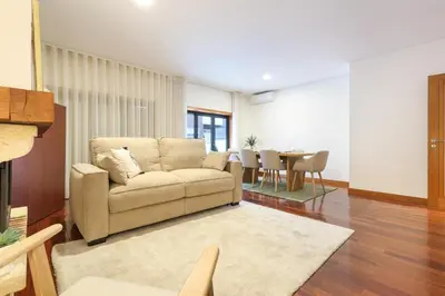 a dining room table with plates and wine glasses at ON Apartments - Family Retreat in Porto
