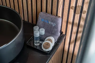 a tray with makeup products on a table at Oporto Nura House Duplex Downtown in Porto