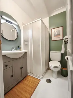 a bathroom with a sink and a mirror at Casa da Lapa Porto in Porto