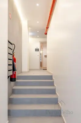 a stairway leading to a hallway in a building at Nicos Garden Apartment - Porto Velho Apt in Porto