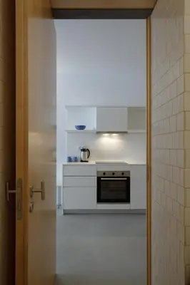 a dining room with a table and chairs at Urban Residences Sacadura in Porto
