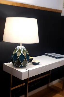 a table with a lamp on top of it at T2P Pilar House in Vila Nova de Gaia