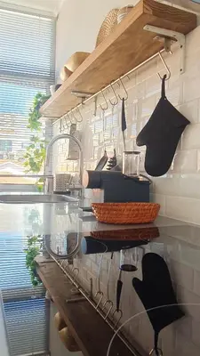 a kitchen with a counter with utensils on it at T2P Pilar House in Vila Nova de Gaia