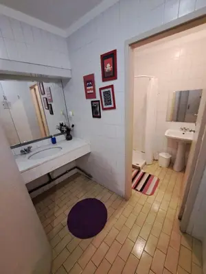 a bathroom with a shower and a toilet and a sink at Center Porto Economic Huge Flat in Porto