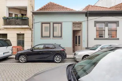 a building with a door on the side of a street at Orange Apartments B in Porto