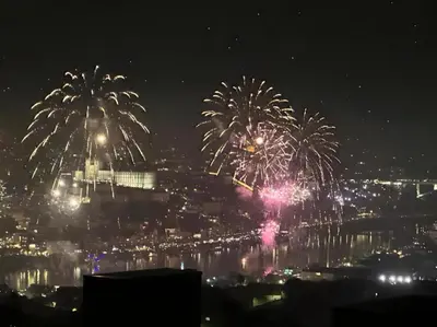 a firework display over a city at night at New Douro Tower 203 With Parking in Vila Nova de Gaia