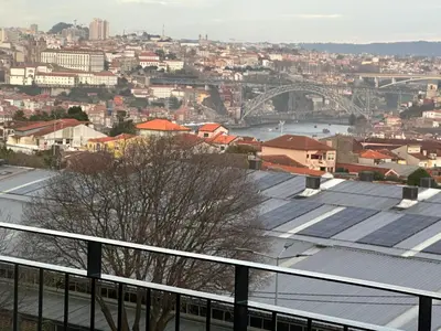 a view of a city from the roof of a building at New Douro Tower 203 With Parking in Vila Nova de Gaia