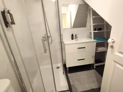 a bathroom with a shower and a sink at Elegant duplex, WiFi, Porto center in Porto
