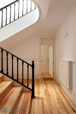 an empty hallway with stairs in a house at Blu Constellation - Santa Catarina in Porto