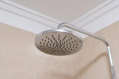 a shower head is attached to a ceiling at GuestReady - Charming Cozy Getaway in Porto in Porto