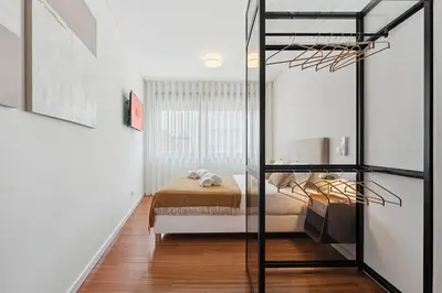 a bedroom with a bunk bed in a room at GuestReady - Blissful escape in Porto in Porto
