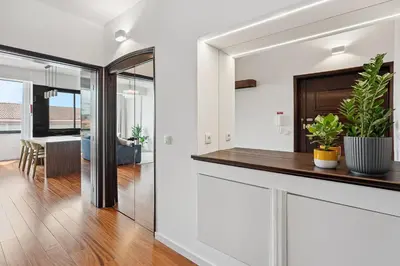 a kitchen with white walls and a counter with plants at GuestReady - Blissful escape in Porto in Porto