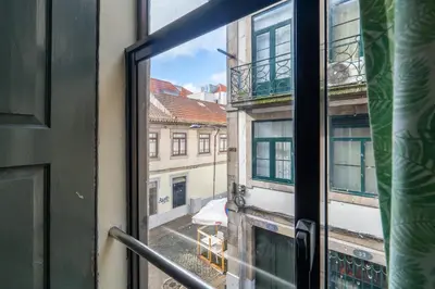 a view from a window of a building at Microloft in the heart of Porto in Porto