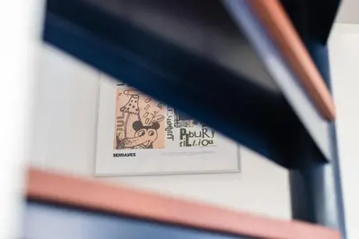 a picture of a dollar bill on a shelf at GuestReady - Timber-framed luxe stay in Porto
