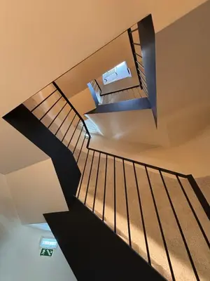 an overhead view of a staircase in a building at Porto- Boavista Casa Da Música - Art Gallery Apartment II in Porto