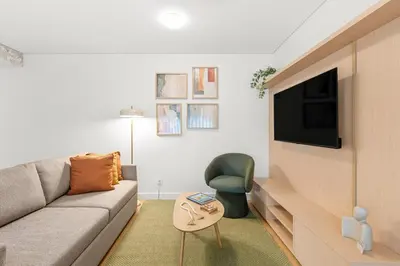 a living room with a couch and a table at Urban Comfort @ Bonfim Boutique Flats in Porto