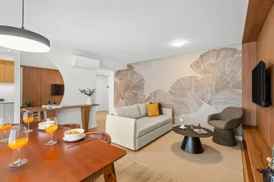 a bedroom with a white bed and a wall at Urban Flow @ Bonfim Boutique Flats in Porto