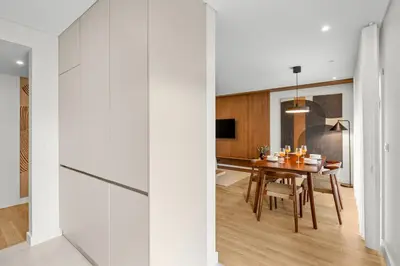 a living room with a table and a couch at Urban Flow @ Bonfim Boutique Flats in Porto