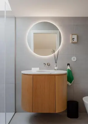 a bathroom with a sink and a mirror at Volta do Patio in Porto