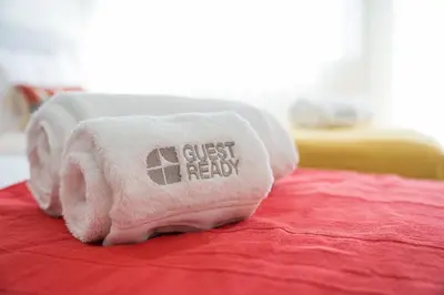 a bedroom with two beds and a window at GuestReady - Charming retreat in Porto in Porto