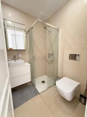 a bathroom with a sink and a mirror at Flores Street Apartment - Porto City Center in Porto