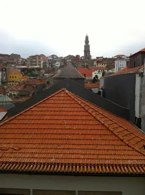 an orange tile roof on top of a building at Historical Porto Apartment in Porto