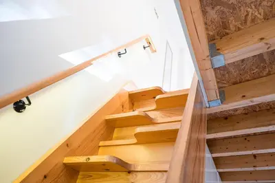 a staircase in a house with wooden floors at GuestReady - charming retreat in Porto in Porto
