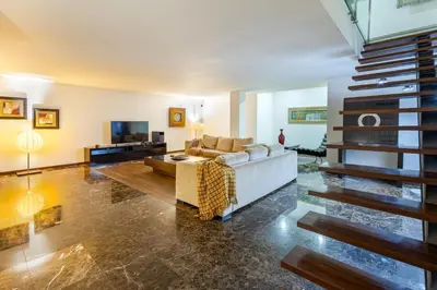 a bathroom with a glass shower and a toilet at Luxury House by ON Apartments in Porto