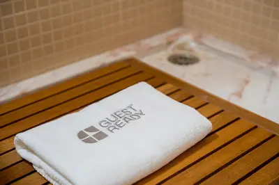 a towel sitting on top of a bath tub at GuestReady - Fantastic house in the city center in Porto