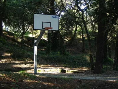 a basketball hoop in the middle of a park at Porto Covelo Park Apartment in Porto