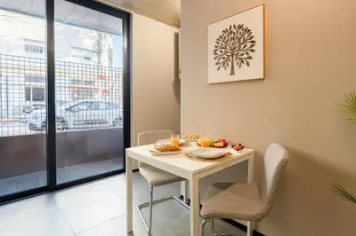 an apartment with a balcony with plants at Modern & Cozy Flats with Terrace by HostWise in Porto