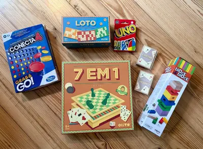 a table with a board game and other toys at Aliados 9 - Luxury in the Heart of Porto in Porto