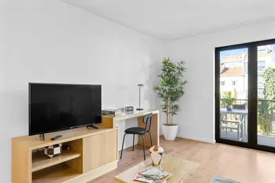 a view of a city with buildings and a park at Bright Apartment with Balcony & Parking | Bonfim in Porto