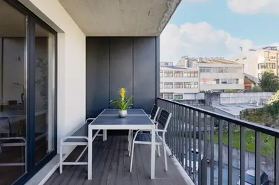 affeepot and a coffee pot on a counter at Bright Apartment with Balcony & Parking | Bonfim in Porto