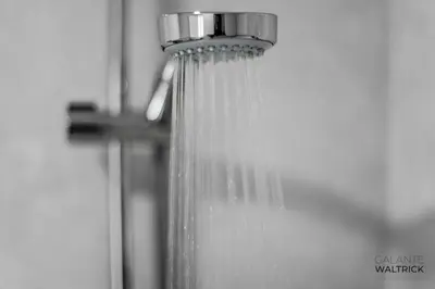 a close up of a shower head with water coming out at 2Bedroom Flat - Families, remote work, downtown - Private Garage in Porto