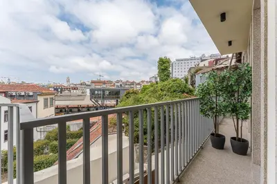 a balcony with a view of a city at GuestReady - Elegant stay in Central Porto in Porto