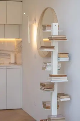 a stack of books on a shelf in a room at The Dome in Porto