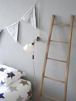 a bedroom with a ladder and a bed and a lamp at Lulapartment II in Porto
