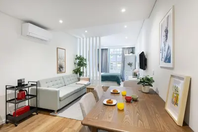 a living room with a couch and a table at Serene Porto Studio @ Marquesa Palace in Porto