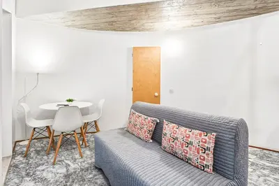a living room with a couch and a table at GuestReady - Charming Porto retreat in Porto