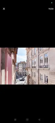 a view of a city street from a building at portochique AL7 in Porto