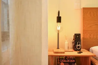a bathroom with a shower and a toilet and a mirror at ON Apartments - MA62 Downtown in Porto