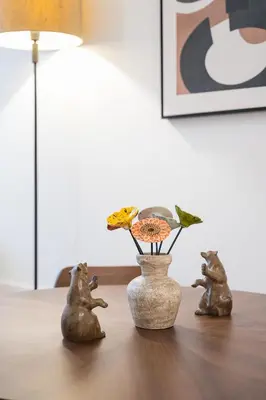 two statues of animals sitting on a table with a vase at Unique Luxury and Quiet in Porto Best Location in Porto