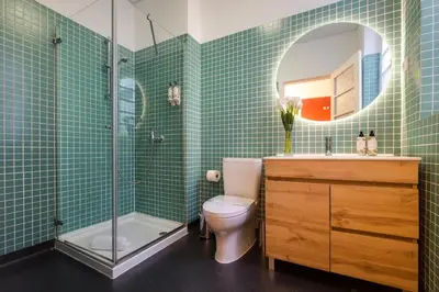 a bathroom with a toilet and a shower and a sink at Duque 3 Luxury Apartment Downtown Porto near Metro in Porto