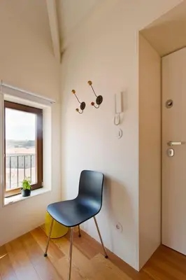 an empty room with a closet and a wooden door at Casa Panorama | Douro Views in Porto