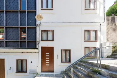 a staircase in a building with wooden walls at Casa Panorama | Douro Views in Porto