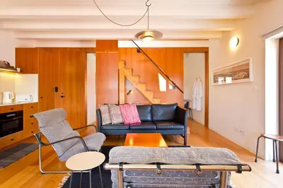 a bedroom with a white bed and a window at Casa Panorama | Douro Views in Porto