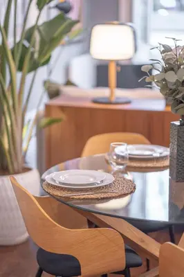 a dining room table with plates on top of it at Historic Porto Stay, Classic Details, City Life in Porto