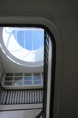 a round window in a building with a ceiling at Belly Angel - Porto Historic Center in Porto
